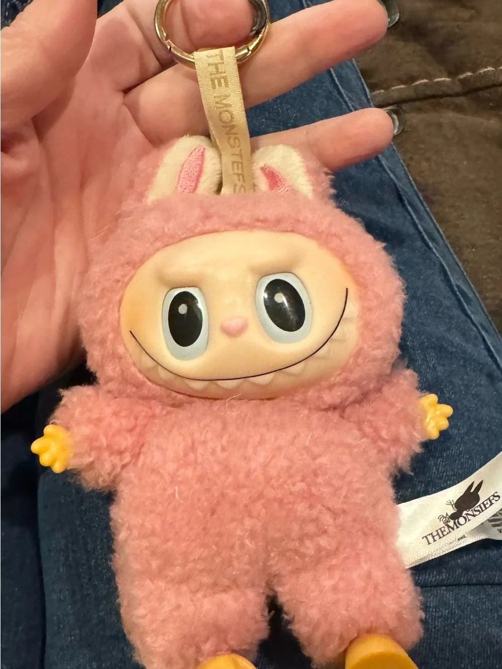 Pop Amrt Labubu key chain.